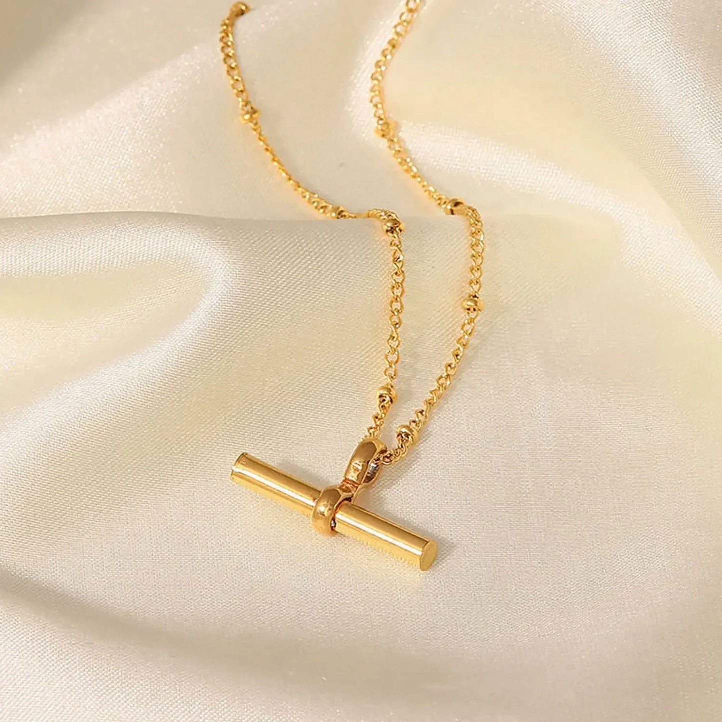 TOBILLERA BARRA EN T