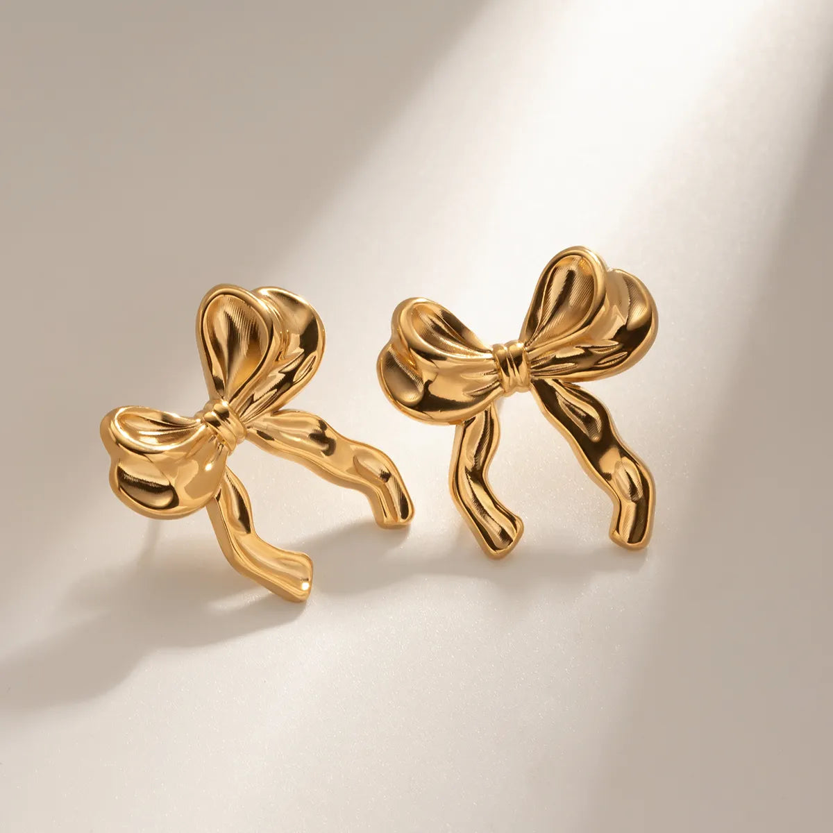 ARETES LAZO COQUETTE